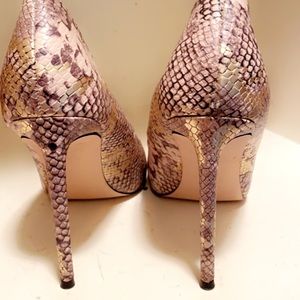 Size 10. Snakeskin heels.